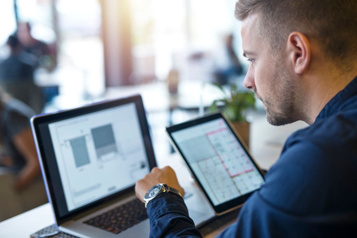 woman working on her laptop and a notebook